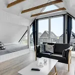 Three-bedroom In Hébergement de vacances